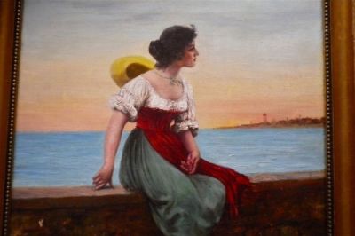 La donna sul muretto