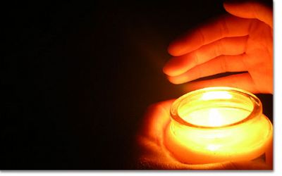 Luce di candela e luce del mattino